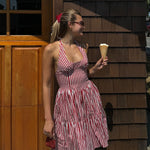 model wearing Lil Effing Clip in Cherry Kiss in hair while holding ice cream in waffle cone