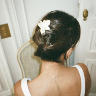 model wearing Hair Pin in Chantilly Wings