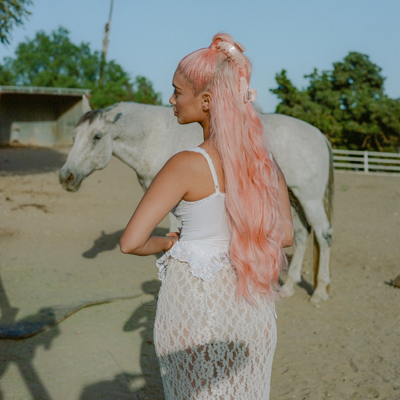 model standing with Big Effing Clip in Dream Daisy + Strawberry Shortcake in hair